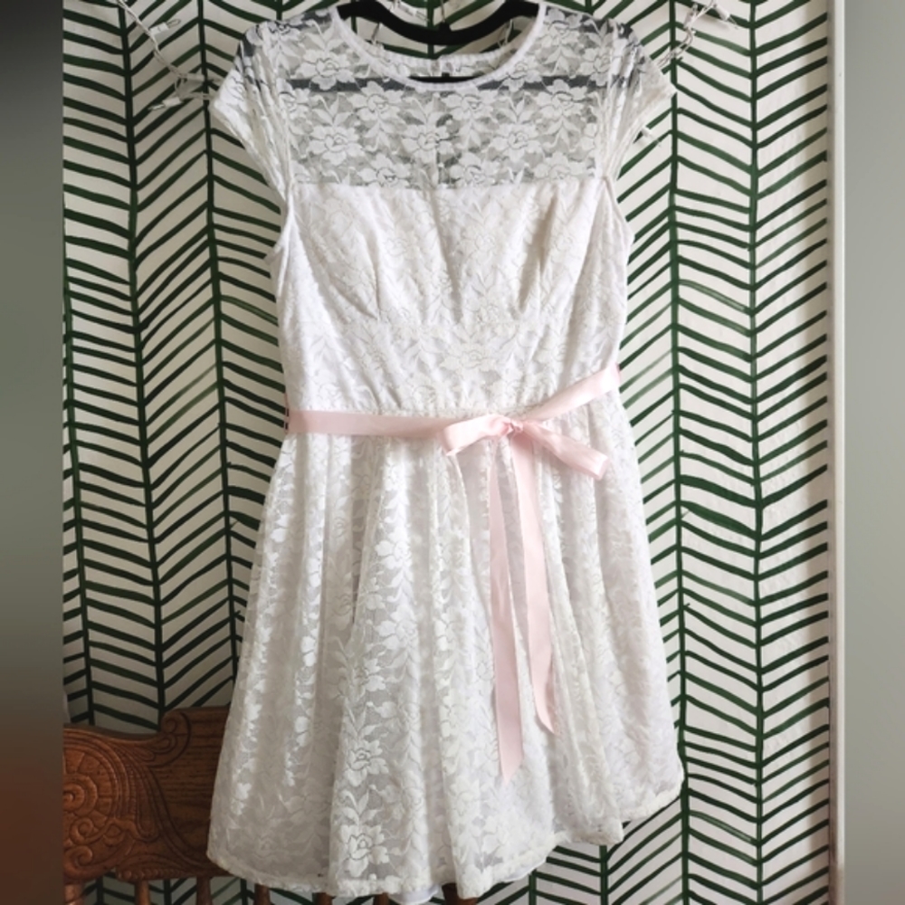 White lace tea dress with pink accent bow